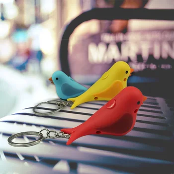 Cartoon värvilisi linde helendav Led võtmehoidja Vocalization mänguasjad võtmehoidja naine kott ripats mini taskulamp Laste kingitused